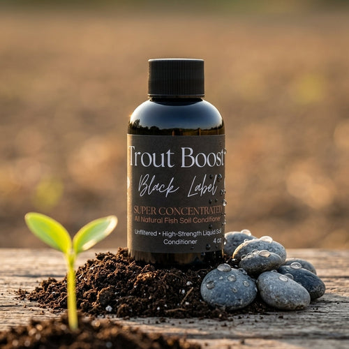 Trout Boost Black Label 4 oz bottle with seedling and soil